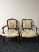 A pair of walnut armchairs