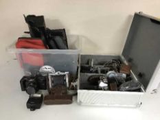 Two boxes and a case of camera equipment - Poloroid, Pratika,