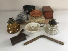 Two glass oil lamps, enamel candle holders, pine box,