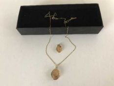 A 9ct gold locket and chain together with one other locket initialed 'C'