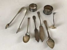 A collection of silver to include two napkin rings,