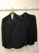 A full rail of gent's dinner suits and striped trousers