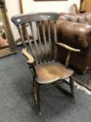 A Victorian elm rocking chair