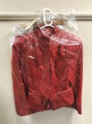 A 1980's red leather skirt suit