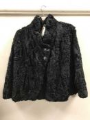 A vintage Belgian fur black jacket