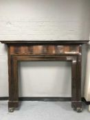 An early twentieth century mahogany fire surround