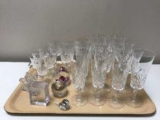 A tray containing assorted lead crystal drinking glasses, glass paperweights,