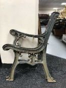 A pair of cast iron bench ends