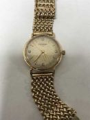 An 9ct gold Longines wrist watch, 49.9g gross.