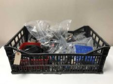 A box of assorted plastic building blocks and plates (like lego)