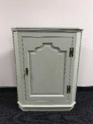 A painted Victorian hanging corner cabinet