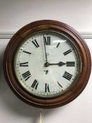 An early twentieth century circular mahogany school clock