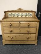 A Victorian pine tiled chest of four drawers