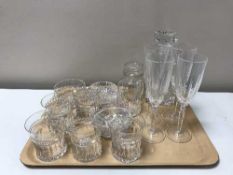 A tray containing assorted lead crystal including a decanter with stopper,