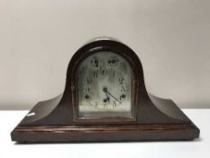 A Victorian mahogany mantle clock with key