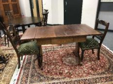 An inlaid Victorian mahogany drop end library table together with pair of Victorian chairs (3)