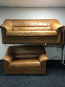 A three seater settee and two seater settee upholstered in tan leather
