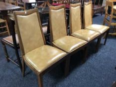 A set of four late twentieth century teak dining chairs
