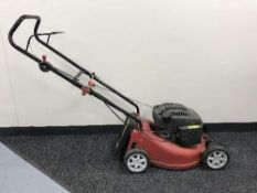 A Sovereign petrol lawn mower