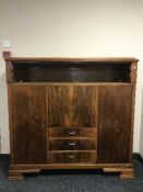 A Continental oak and walnut cocktail sideboard