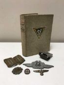 A volume - The Story of the 79th Armoured Division, together with several Nazi rank badges,