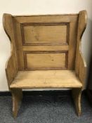 A reclaimed pine hall seat