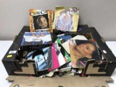 A box containing 45's including Dexy's Midnight Runners,