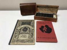 A set of ivory faced dominoes together with a backgammon set in leather pouch and two volumes - The