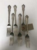 A set of six silver forks
