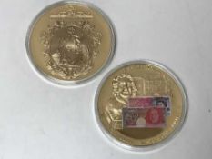 Two collector's banknote medals (2)