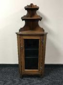 A Victorian mahogany glazed corner cabinet