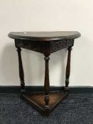 A Jaycee oak d-shaped hall table