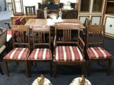 A set of four nineteenth century continental inlaid mahogany dining chairs