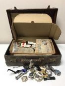 An Albert Trotter vintage suitcase containing a quantity of miscellaneous wrist watches,