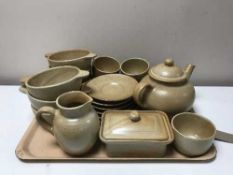 A twenty-one piece stoneware tea service with soup bowls and butter dish