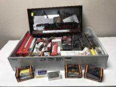 A Marklin locomotive 14894 in display case together with a box of assorted die cast vehicles.