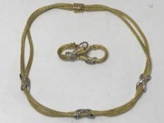 An impressive Mappin and Webb collar and earring set, 18ct gold and set with diamonds,