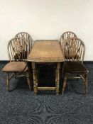 A Jaycee oak gateleg table and four chairs