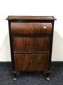 A mahogany three drawer chest on cabriole legs