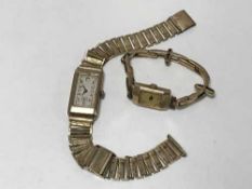A gents vintage gold rectangular cased wristwatch, circa 1940's,