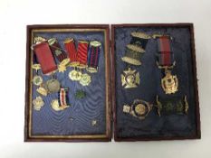 A group of three silver and enamelled Order of Buffaloes medals together with twelve enamelled