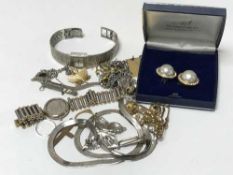 A collection of various costume jewellery, butterfly brooch etc.
