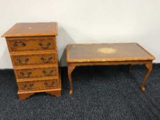 An inlaid yewwood audio cabinet together with yewwood glass topped coffee table