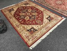 A Persian Heriz carpet 230 cm x 160 cm