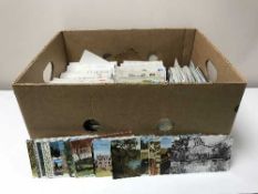 Two boxes containing a large quantity of assorted postcards, foreign etc.
