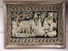 An Indian embroidered panel, 64 cm x 86 cm, framed.