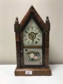A Victorian rosewood mantel clock