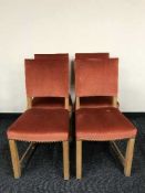 A set of four oak upholstered dining chairs