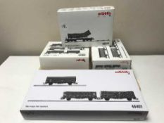 Two Marklin freight car sets 46401 and 46080 together with three other car sets 46802,