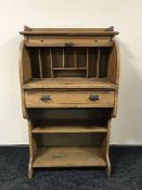 An Edwardian oak roll topped lady's bureau